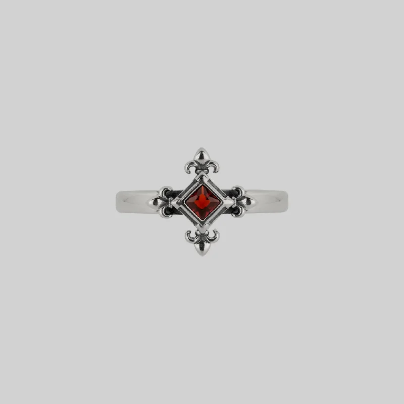 CRIMSON. Medieval Fleur de Lis Garnet Ring - Silver