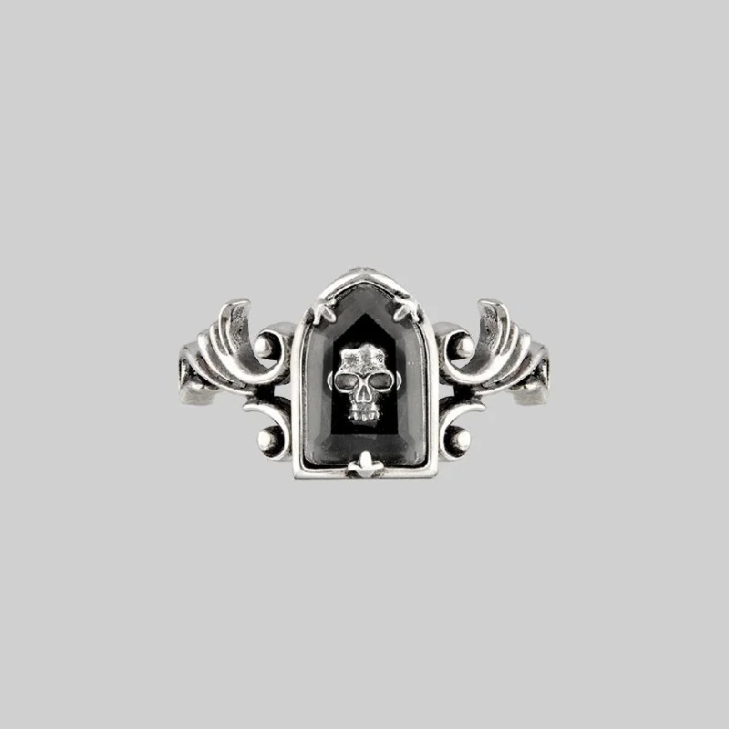 OMINOUS. Skull Under Glass Ring - Silver