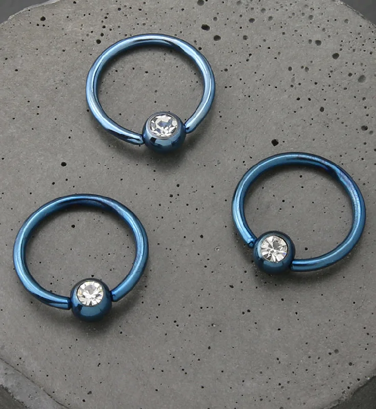 Light Blue PVD Clear CZ Captive Ring